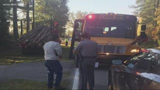 Caught on camera: Logging truck nearly misses school bus