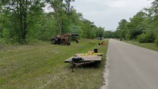 Massey 265 hauling a log