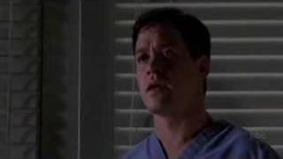 Izzie and Denny kiss