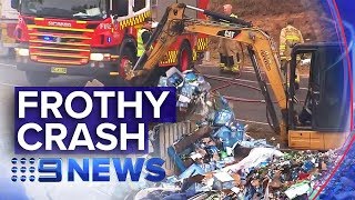 Tonnes of beer lost when truck and ute collided on M7 | Nine News Australia