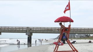 People swimming in dangerous waters at Jacksonville Beach