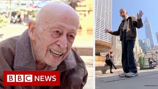 Man, 89, dances in New York streets after Covid vaccination - BBC News