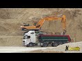 hyundai 520 lc 9 excavator loading volvo u0026 scania truck s in a gravel pit