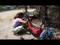 Genius girl repairs, manufacturing, restores and assembles severely damaged motorbike. Girl mechanic