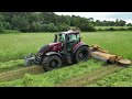 4kᵁᴴᴰ hay harvest 2024 valtra t255 twintrac mowing with an elho duett 7300 7.3m mower conditioner.