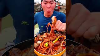 Chinese fisherman cooking and Eating fresh seafood...