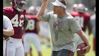 High-energy Alabama football coach in practice