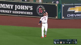 TB@HOU: Gattis gets hit with backswing, stays in