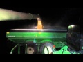 Unloading beans at night from John Deere S680 to Brent 1594 cart