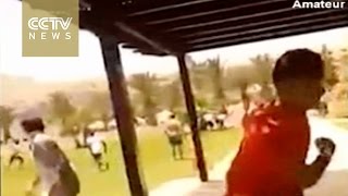 Dramatic video shows Tunisian tourists fleeing during terror attack