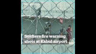 US-led coalition soldiers fire warning shots at Kabul airport