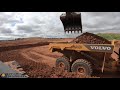 volvo ec950f loading a60h trucks in 4 buckets