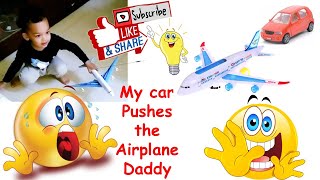 My car Pushes the Airplane Daddy!