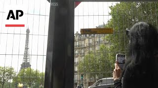 Tourists visiting Paris face barriers on the way to main landmarks ahead of Olympic opening ceremony