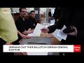 germans cast their ballots in germany s high stakes general election