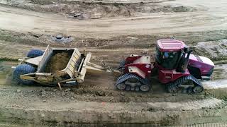 Case IH STX450 Quadtrac Pulling an Ashland I-180 Pan Scraper | Drone View