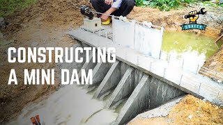 How to make a mini dam with blow down gates?