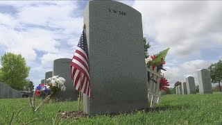 Family members of Abilene veterans begin placing flags at cemetery for Memorial Day