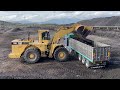 caterpillar 990 wheel loader loading lorries with three passes s.g.m melidis