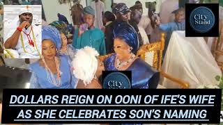 DOLLARS RAIN ON OONI OF IFE'S WIFE AT A SON'S NAMING CEREMONY