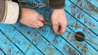 Making bird feeders Xmas decorations out of willow