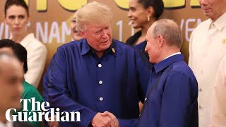 Donald Trump and Vladimir Putin shake hands at Apec