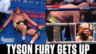 The SHOCKING moment Tyson Fury RISES FROM THE CANVAS after Deontay Wilder thinks he is KNOCKED OUT🤯