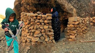 Building a traditional house for baking bread with suffering and hardship