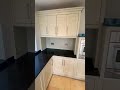 hand painted kitchen in the colour stoney ground by farrow and ball