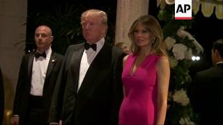 Trumps arrive at Florida gala amidst protests