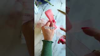 How to make a pom pom bow! #Ribbon #crafting #wrapping #giftideas