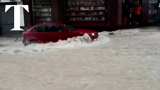 Car swept away during torrential downpour in Spain