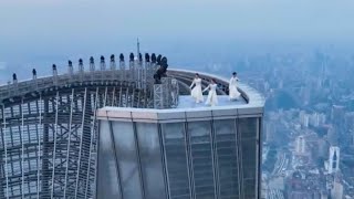 Tai chi masters practice atop China's skyscrapers for Spring Festival Gala show