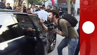 Protesters attack Spanish finance minister's car in Barcelona after political rally | euronews 🇬🇧