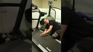 How to check for running belt and deck wear on a treadmill