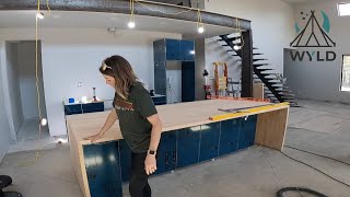 WE HAVE AN ISLAND | diy kitchen island & trimming our shouse