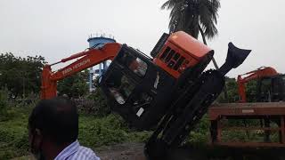 Tata Hitachi ex70 unloading