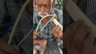 The Mysore rebab player ( instrument) Legend