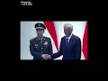 china s defense minister who s under us sanctions shaking hands with his singaporean counterpart