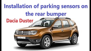 Installation of parking sensors on the rear bumper of Dacia Duster