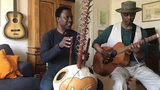 I Shall Not Be Moved - Eric Bibb with kora master Lamine Cissokho.