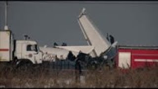 Wreckage, guards, at site of deadly Kazakh crash