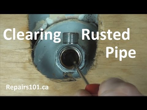 How do I remove corrosion from galvanized pipe?