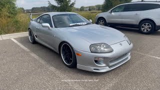 A Silver Toyota Supra MK4