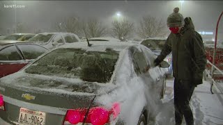 Shoppers head out for last minute shopping during winter storm conditions