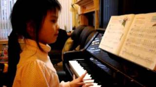 Christine plays piano.AVI