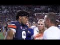 Bryan Harsin embraces Robby Ashford and family before leaving the field following 21-17 loss to LSU