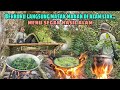 Berburu langsung masak makan di hutan