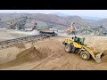 cat 972m wheel loader loading trucks312k