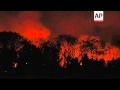 Crews battle huge flames as fire burns in an ecological reserve south of Buenos Aires